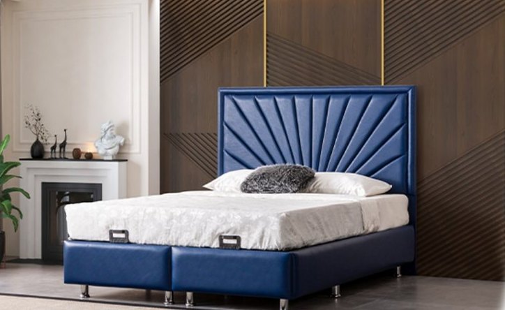 Blue leather box spring with a sunburst headboard